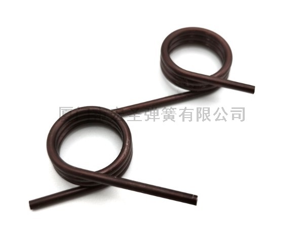 扭转弹簧在健身自行车中是如何使用的？