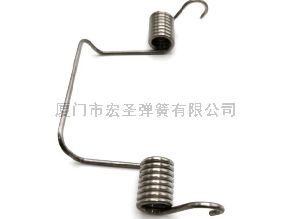 扭力弹簧用于输送系统，为输送带提供张力和支撑。